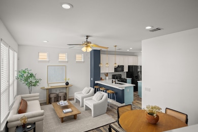 Living room featuring wood finished floors, reces