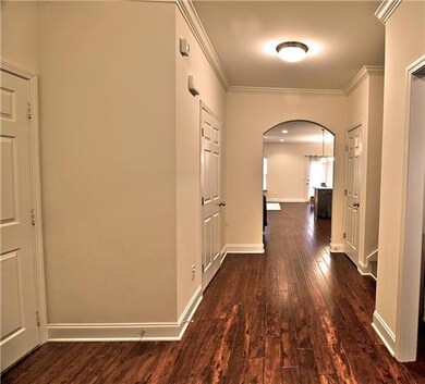 Welcome! Dining room/Office directly to the right, garage entry into home on the left, with kitchen and living room straight ahead! Multiple closets down the hall, stairway on the right.