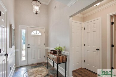 Front foyer is lovely with its unique cracked-glas