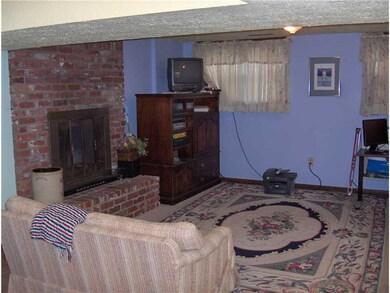 Family Room. Family room with stone fireplace and 