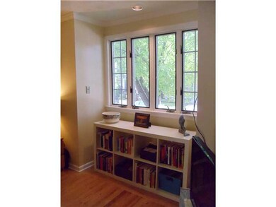 Living Room. Main level sits up off of the street 