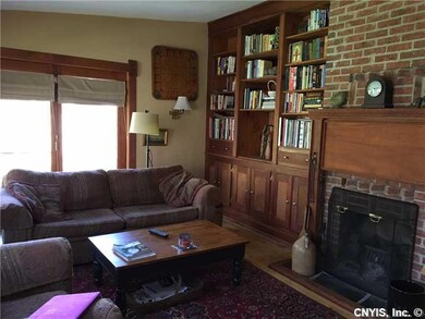 Family Room. Cozy room with wood fireplace exposed