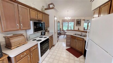 Vaulted ceilings continue throughout!  Open concep