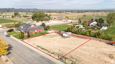 View of rural area with property parcel outlined and a mountain backdrop
