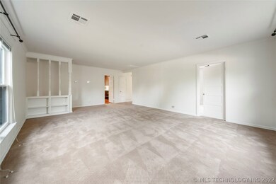 Another view of the formal living room with door o