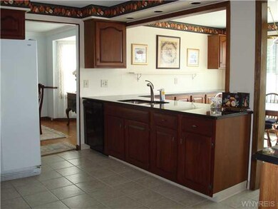 Kitchen. Granite countertop, double stainless sink