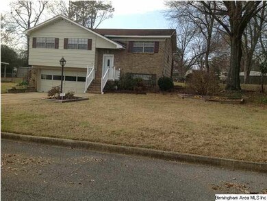 Front view of Home and garage.
