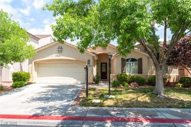 Mediterranean / spanish-style house with an attach