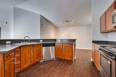 Kitchen featuring appliances with stainless steel