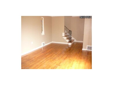 LARGE LIVING ROOM WITH HARDWOOD FLOORS
