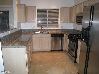 Kitchen featuring appliances with stainless steel