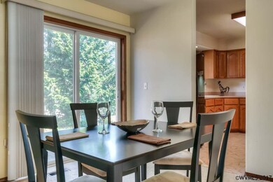 Dining area features backyard and kitchen access