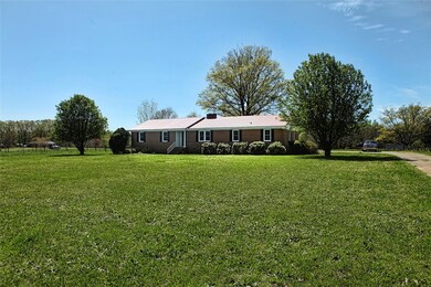The home is situated on this 1+acre lot so that it
