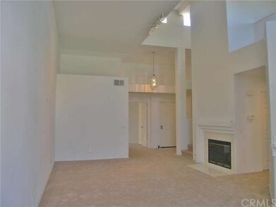 Great Room Towards Front Door & Secondary Bedroom.