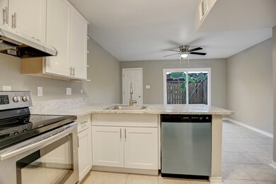 With snack bar and elegant built-in cabinets.