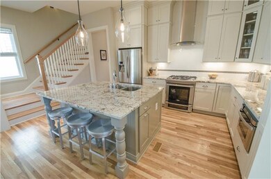 The 5 burner gas range also has Convection Oven PLUS a lower Baking Drawer...not just storage for your cookie sheets. You can actually bake the cookies there! Sharp Microwave Drawer. Incredible storage with these stacked cabinets!