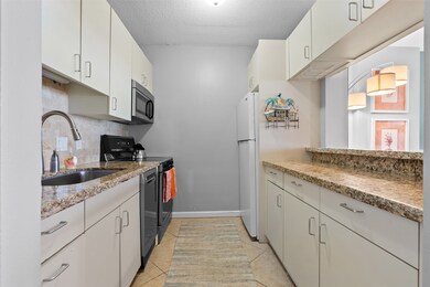 The efficient kitchen is stacked with all kitchen