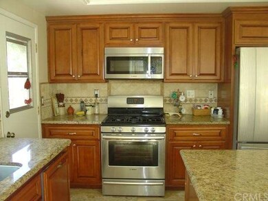 Kitchen Cabinetry has Roll Out Drawers & Stainless