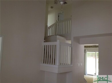 living room with soaring ceilings
