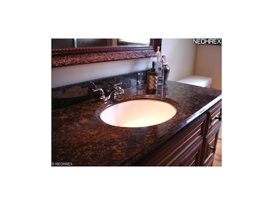 Newly remodeled baths with granite counter tops.