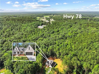 Aerial overview of property's location with property parcel outlined