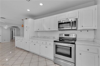 Kitchen featuring visible vents, appliances with s