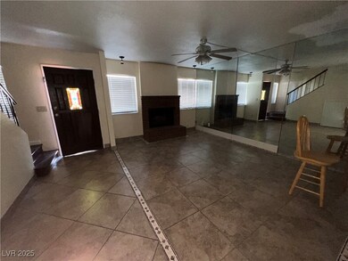 Unfurnished living room with baseboards, a ceiling