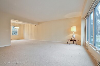 Sun filled Living Room with large picture window.