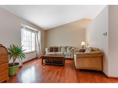 The main floor offers a vaulted ceiling and large 