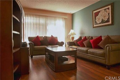 Living room close-up with laminated wooden floorin