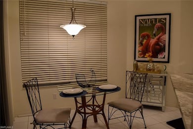 15218 Storrington Place unit M100, Naples, FL 34110 - photo 2