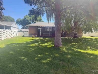 View of fenced backyard
