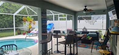 View of swimming pool featuring a fenced backyard,
