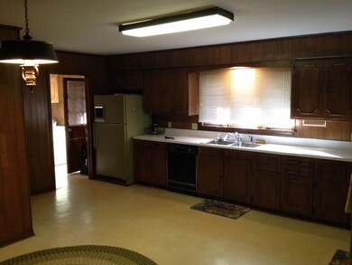 Kitchen looking towards Laundry Room and Back Door