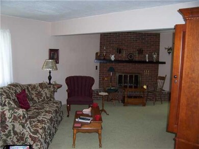 Living Room. Great room with wood burning fireplac