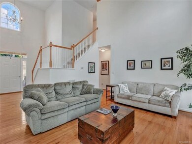 The two story family room is perfect for entertaining.