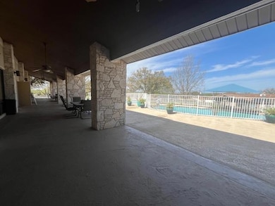View of patio / terrace featuring ceiling fan
