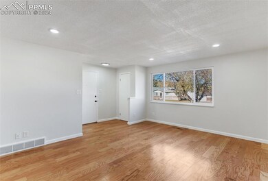 View from Living Room to front door.