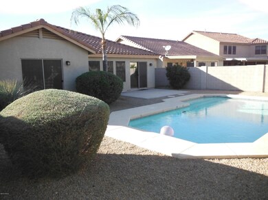 MASTER BEDROOM LOOKS OUT TO POOL