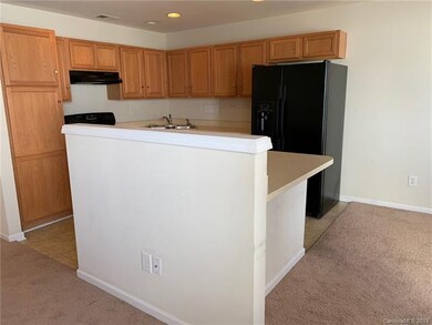 Spacious kitchen with plenty of cabinets and break
