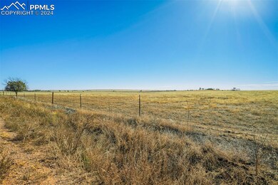 View of yard with a rural view