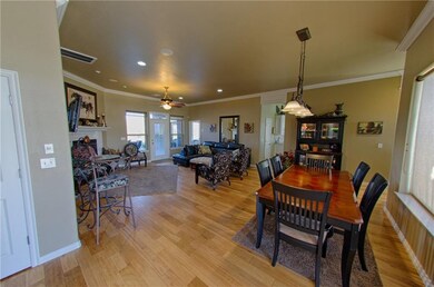 Open, sunshine filled living area and dining area 