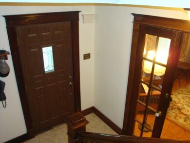 ENTRY W/FRENCH DOORS LEADING TO LIVING ROOM