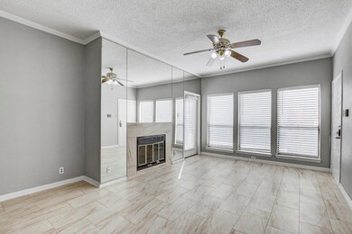 Unfurnished living room with a textured ceiling, 