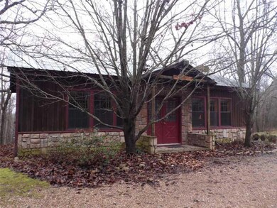 Exterior Front. Terrific location just off Hwy. 62 and just a few miles to Beaver Lake and White River.