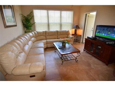 Living Room - Leather Sofa upgrade with sofa bed.  French door beyond leading to Balcony.