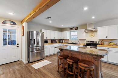 Kitchen featuring stainless steel appliances, a s