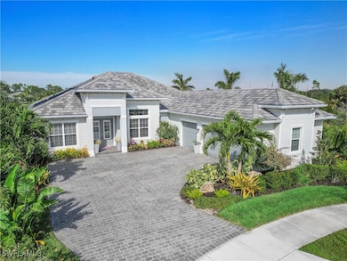 Ranch-style home featuring a garage, decorative dr