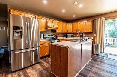 Spacious Kitchen with Island and Stainless Applian