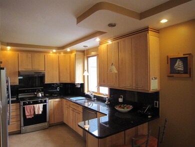 Custom Custom highlights the interior finishes of this house.  Owner handcrafted cabinets, doors, floors, decorative rails, bar, and more!